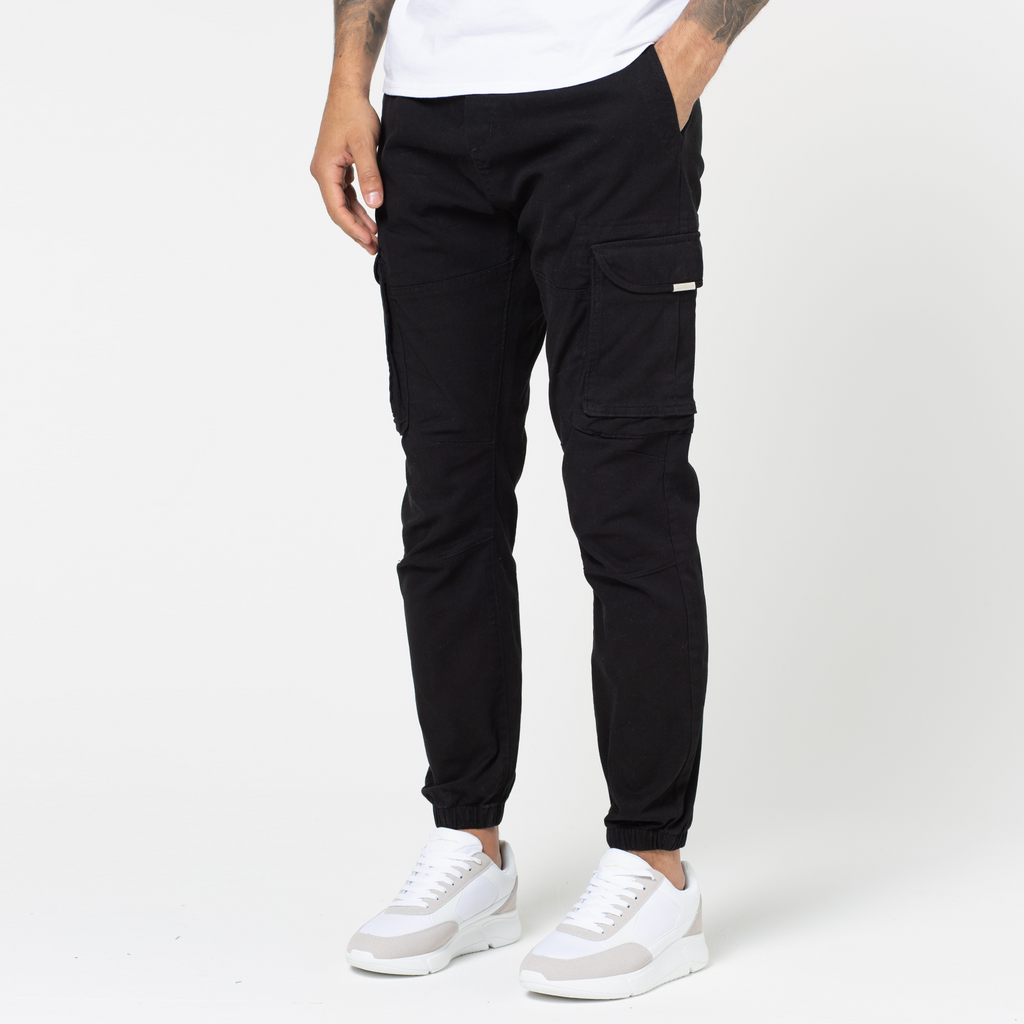Men's black utility cargo pants with cuffed feature and two big pockets