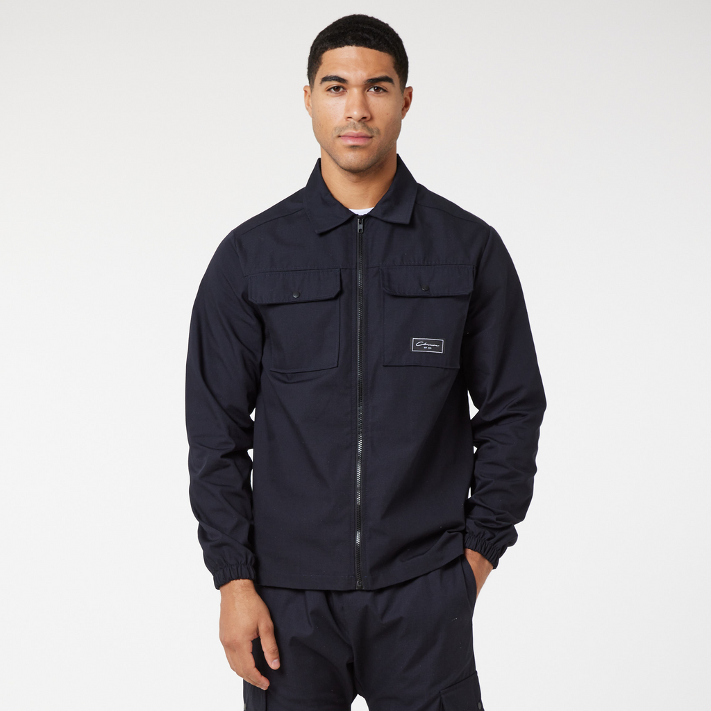 Men's zip overshirt jacket zipped up in navy with small white logo