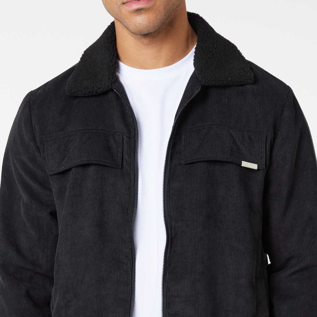 black men's trucker overshirt jacket open showing fleece lined collar and white top