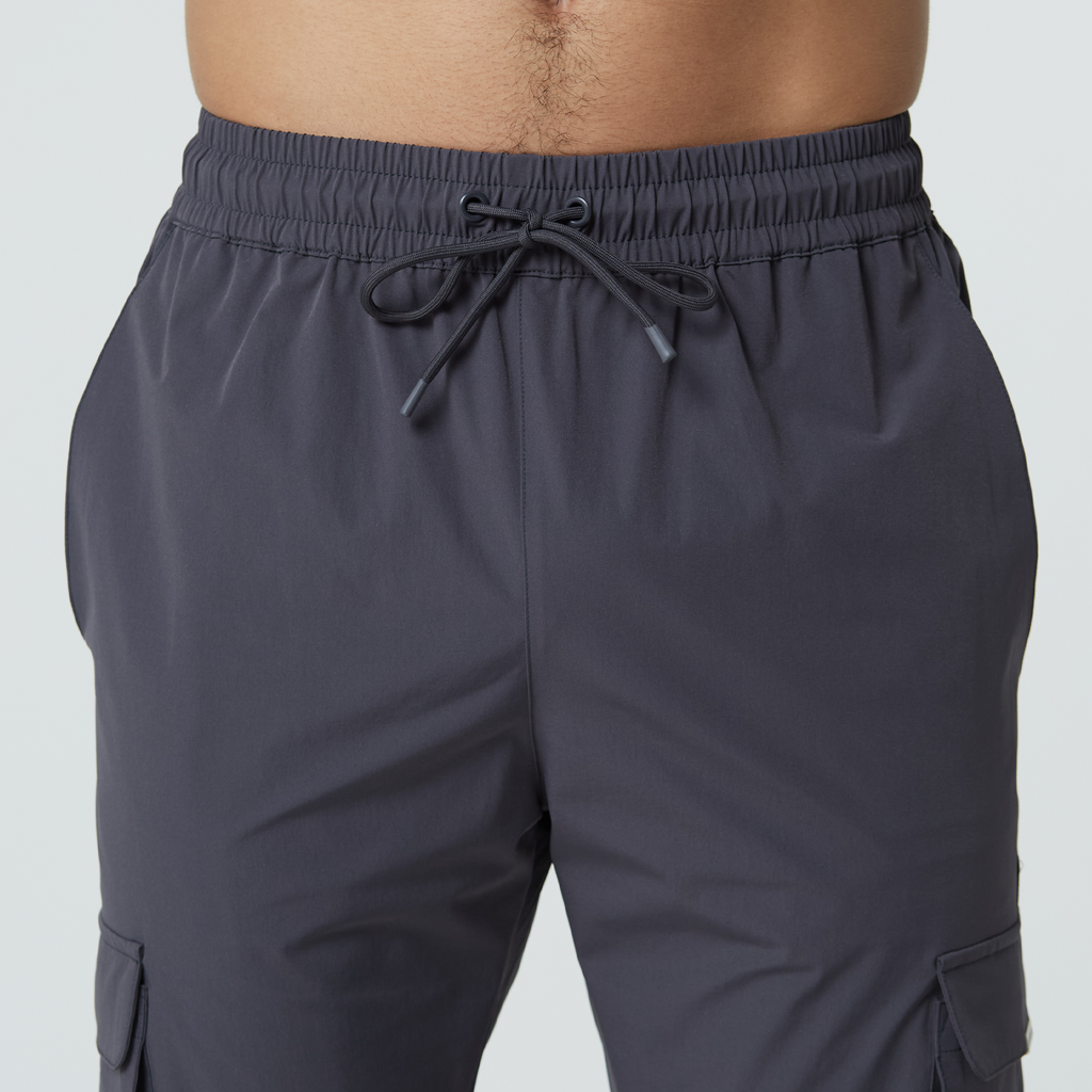 Dark grey men's utility cargo pants adjustable waistband in dark grey