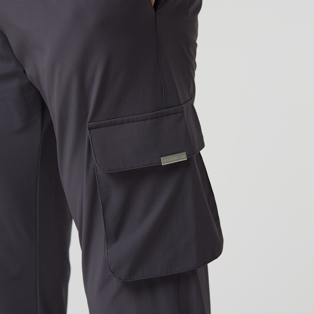 Men's cargo trousers pocket in dark grey with silver "CLOSURE LDN" logo