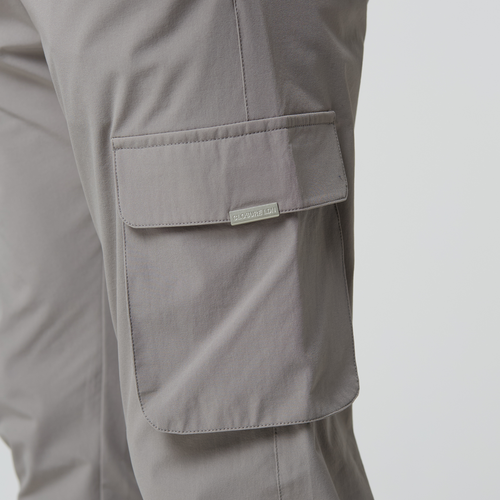 Sand affordable cargo pants pocket with silver "CLOSURE LDN" logo