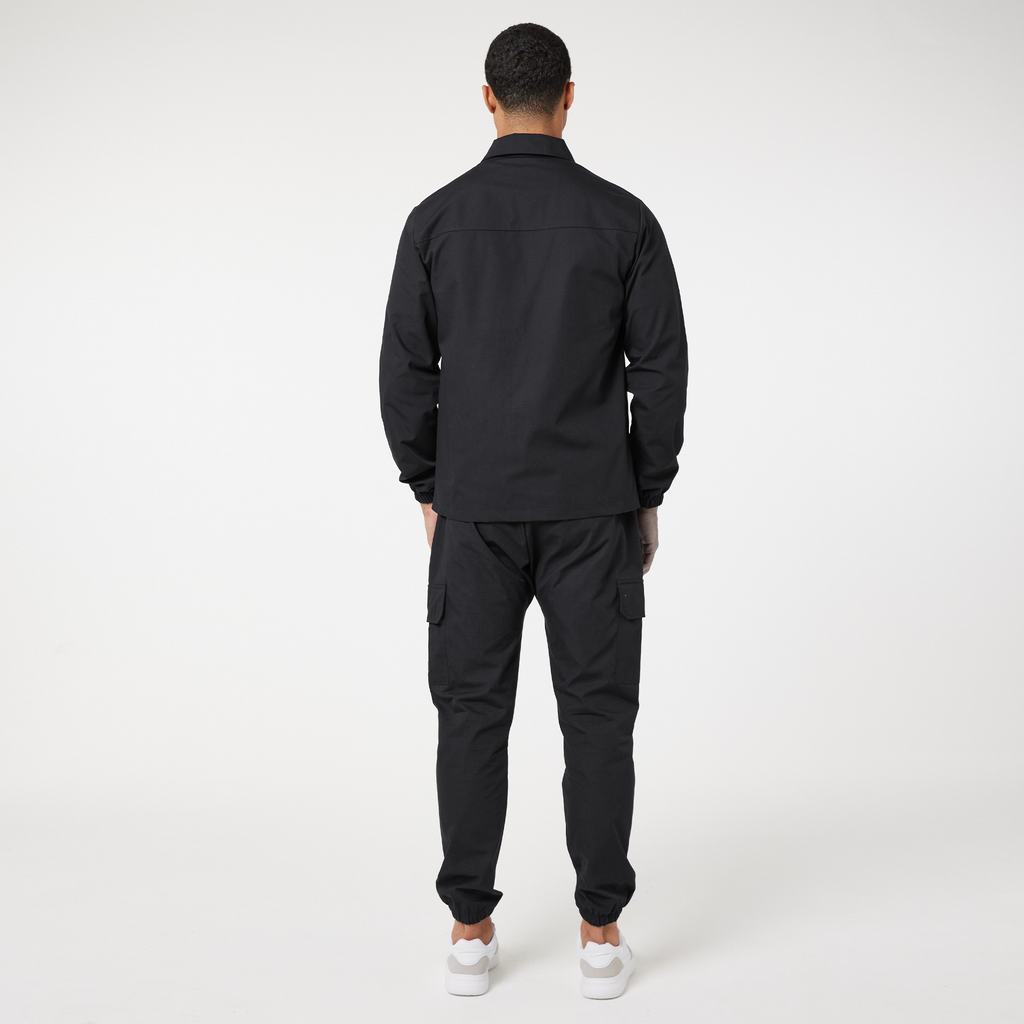 Back of a black matching cargo men's twin set