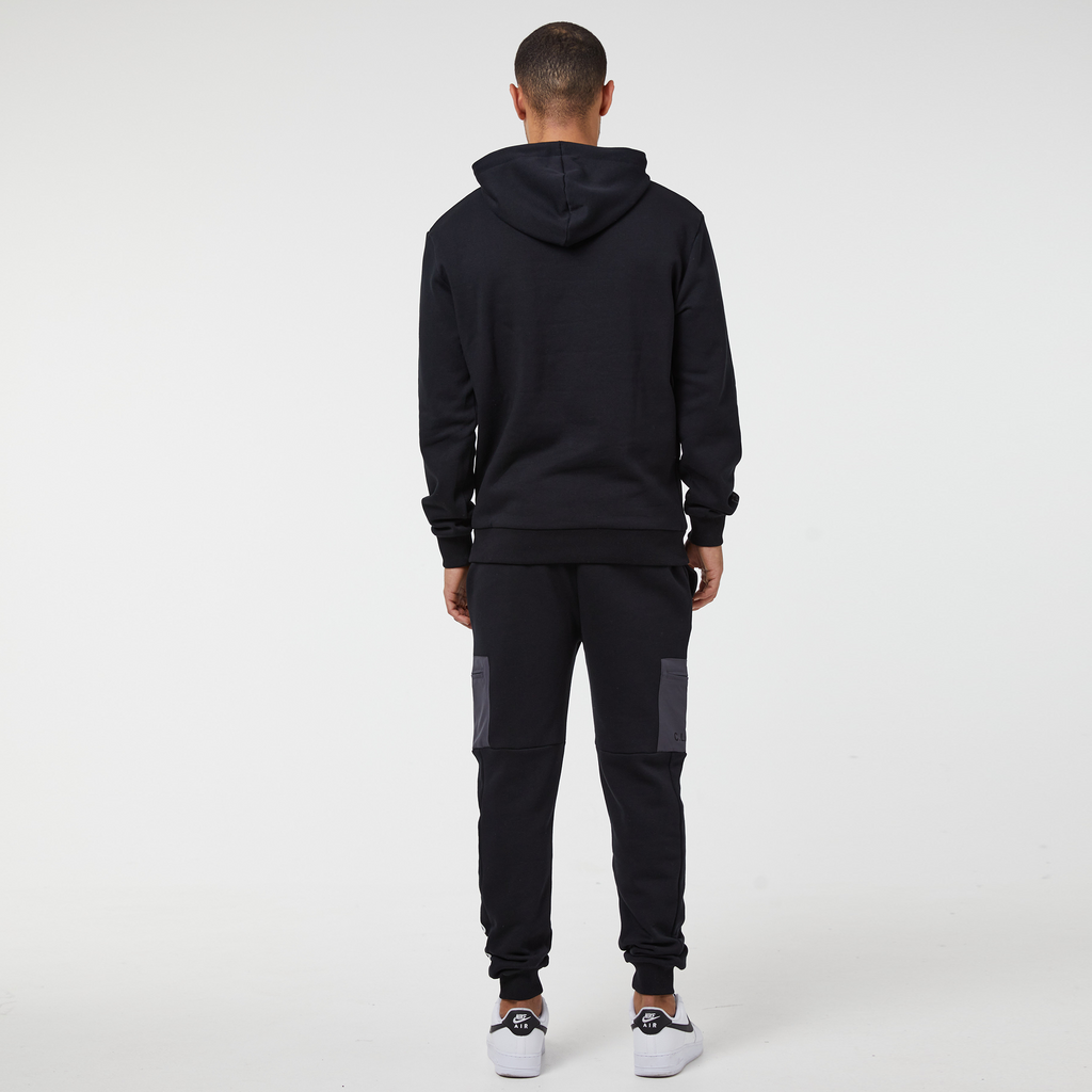 Plain back of mens tech tracksuit in black with contrast pocket